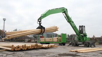 Green Logistics specialist: An 830 M transports and loads poles and railway sleepers