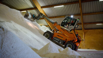 Winter service vehicle efficiently loaded with salt